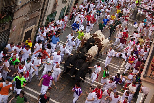 What cities in Spain have bull runs?