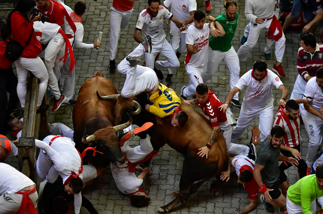 How do I get tickets for the Running of the Bulls fiesta?